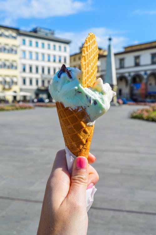 Free Person Holding Ice Cream Stock Photo