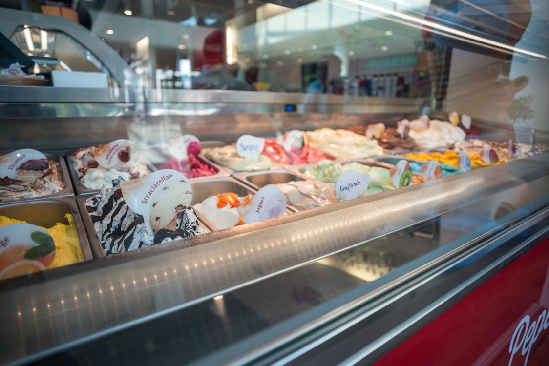 Free Assorted-flavor of Ice Creams Inside Deep Freezer Stock Photo