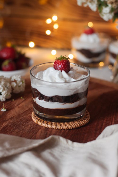 Free Chocolate Mousse and Whipped Cream Dessert Topped with Strawberry Stock Photo